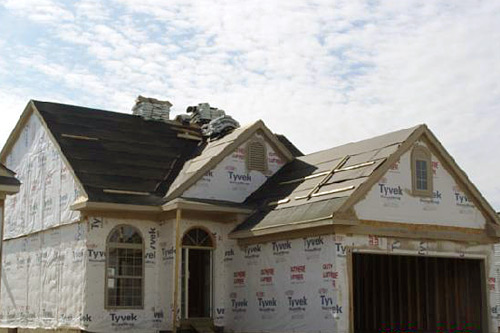 
                    Construction underway for one of the 200 units built to address the city of Hamtramck's conscious decision to relocate the majority of its African-American community.
                                            (Courtesy JRJ Consulting)
                                        