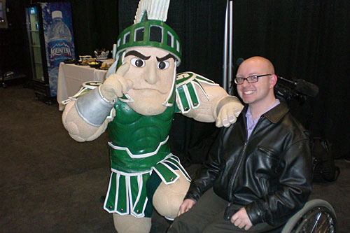 
                    Chad Swiatecki with Sparty the Spartan, the mascot for Michigan State University.
                                            (Courtesy Chad Swiatecki)
                                        