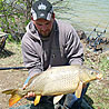 John Parker shows off his 18-pound carp