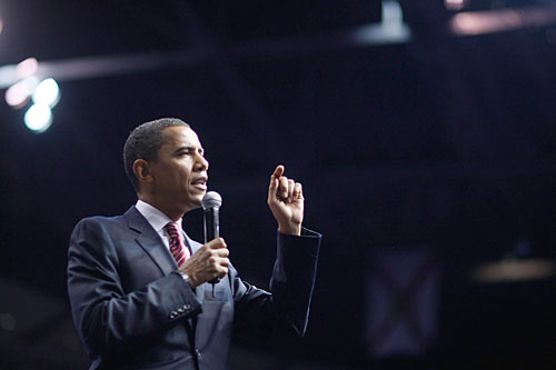 
                    Presidential hopeful Sen. Barack Obama (D-IL) speaks during a May 23 rally in Sunrise, Fla. His mixed racial heritage, and the possibility that he may win the White House, has prompted many Americans to confront deeply held beliefs about racism.
                                            (Joe Raedle/Getty Images)
                                        