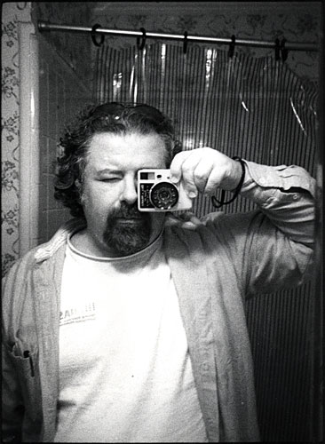 
                    Alexander Thompson in a photograph made using one of his smallest cameras, the Canon Dial 35 from the 1960s. Thompson refuses to give up film for digital.
                                            (2008 silverimagelimited.com)
                                        