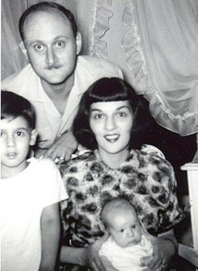 
                    Mark Kaufman (lower left) as a boy poses with his father, mother Fae and baby sister Penina, or "Penny."
                                            (Courtesy Mark Kaufman)
                                        