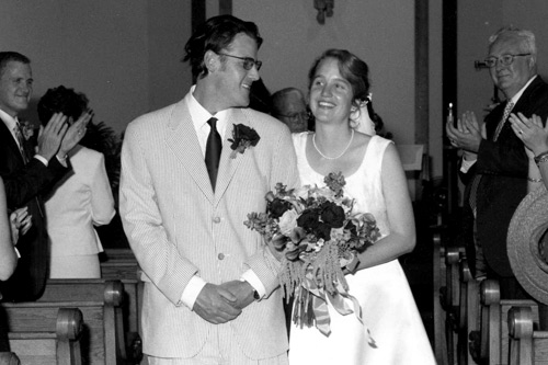 
                    Brooke Williams and Christopher Burke on their wedding day at Our Lady Queen of Peace Catholic church. Their time slot at the chapel was nearly scooped from them by an uppity editor for Martha Stewart Living.
                                            (Courtesy Brooke Williams)
                                        