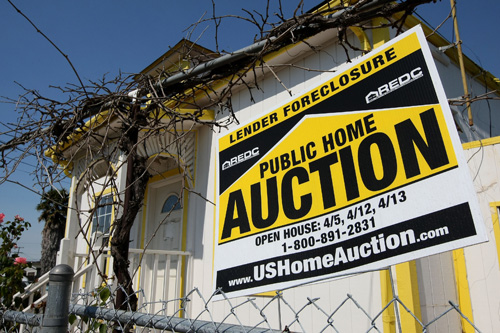 
                    Congress is passing a bill to help homeowners facing foreclosure and to shore up struggling mortgage giants Fannie Mae and Freddie Mac.  President Bush doesn't love it but he won't veto it.
                                            (Photo by Justin Sullivan/Getty Images)
                                        