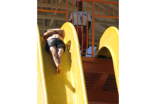 
                    Selier going over the edge of the water slide.
                                            (Nancy Mullane)
                                        