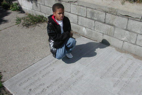 
                    Daijon McDonough, a St. Paul resident who often passes by sidewalk poems as he walks through his neighborhood.
                                            (Chris Roberts)
                                        