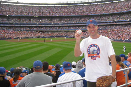 
                    Zack Hample poses with his famous baseball.
                                            (Courtesy Zack Hample)
                                        