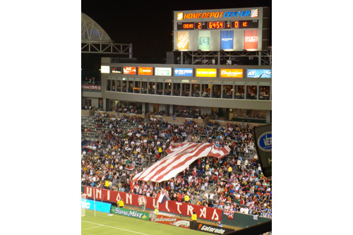 
                    Members of the Union Ultras unfurl a large Chivas USA shirt toward the end of a recent game.
                                            (Charlie Schroeder)
                                        