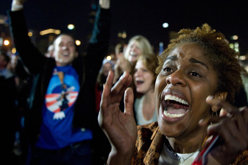 
                    Supporters of Democratic presidential candidate Barack Obama react as television networks project Obama the winner of the election during his election night rally at Grant Park in Chicago, Illinois.
                                            (Saul Loeb/AFP/Getty Images)
                                        