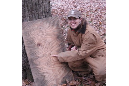 
                    Nancy points to her mark on the homemade target.
                                            (Nancy French)
                                        