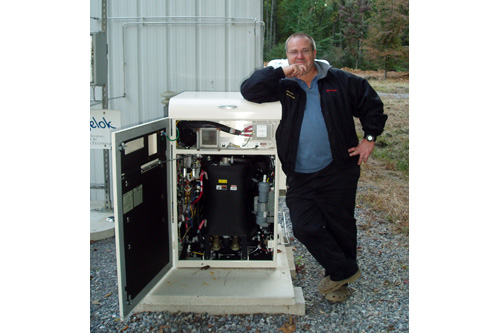 
                    Mike Strizki and the fuel cell he uses to power his house.
                                            (Eugene Sonn)
                                        