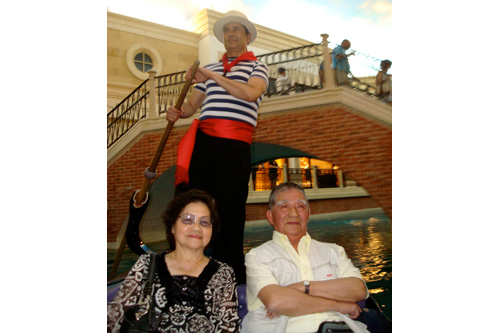 
                    Regina and Kenneth Mok enjoy a gondola ride at the Venetian Hotel in Las Vegas. The couple visited Venice, Italy 36 years ago and wanted to relive the experience.
                                            (Courtesy Charlie Schroeder)
                                        